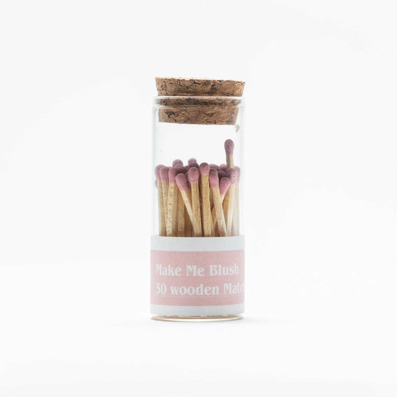 Jar of wooden matches with a cork lid on a white background